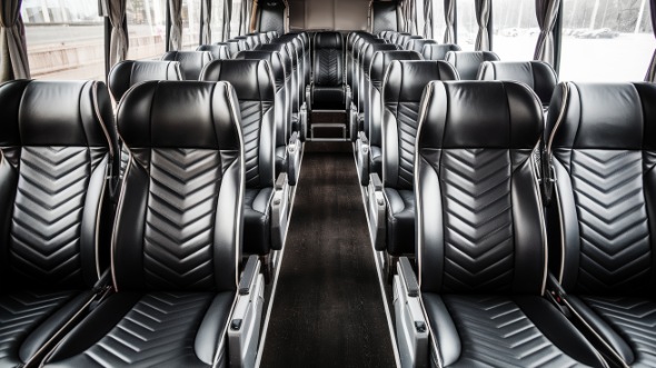 50 passenger charter bus inside college station