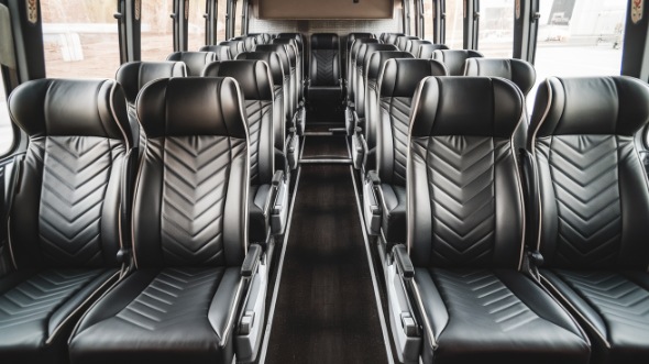 56 passenger charter bus inside college station