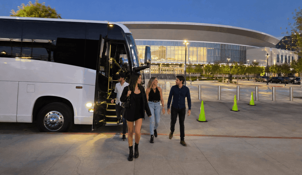 charter bus dropping off a group near dickies arena in fort worth before a concert