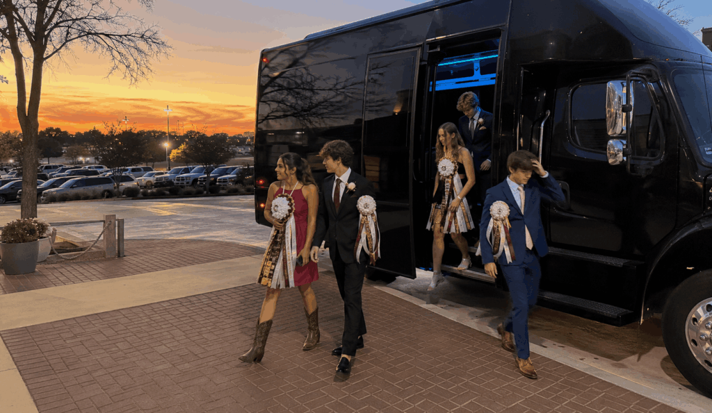 party bus arriving with students for a Fort Worth homecoming dance night