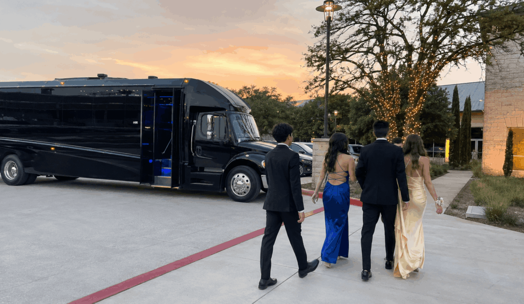 prom attendees arriving by party bus for dinner in downtown fort worth