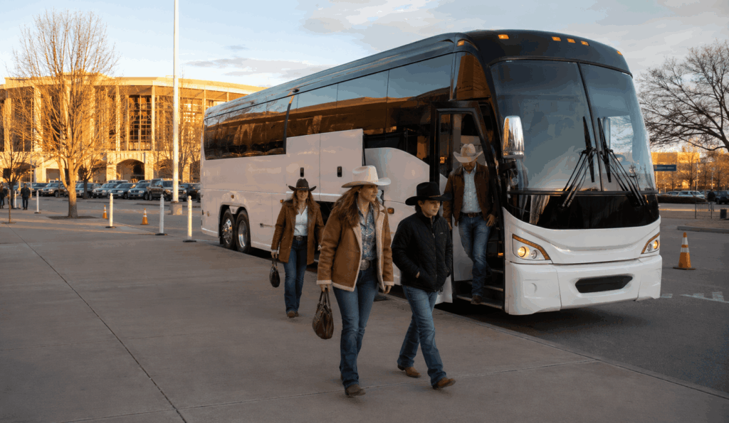 charter bus dropping off a group near will rogers memorial center for the fort worth stock show and rodeo
