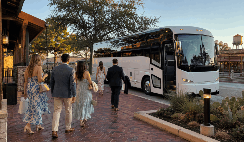 wedding guests boarding a charter bus near hotel drover in the fort worth stockyards