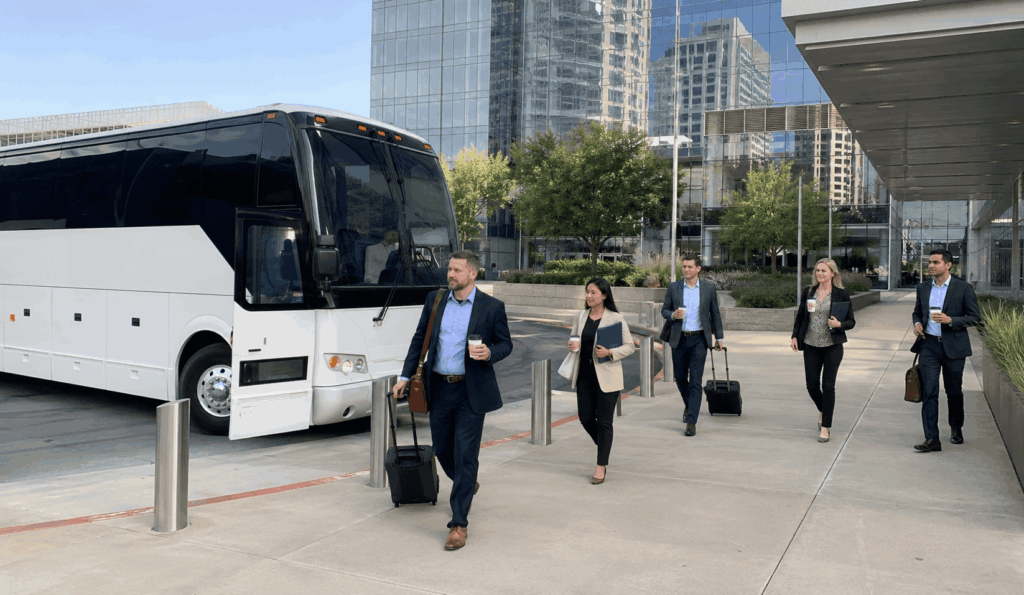 charter bus dropping off corporate attendees near the irving convention center at las colinas