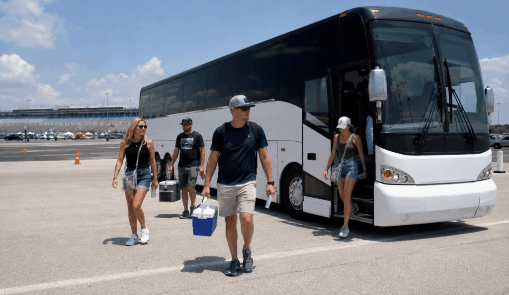 charter bus dropping off race fans near texas motor speedway in fort worth